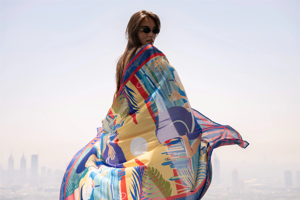 Aura Skypool Boutique campaign photo with a printed scarf